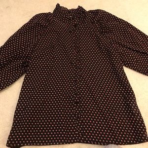 Black blouse with red & off white. Ruffle details